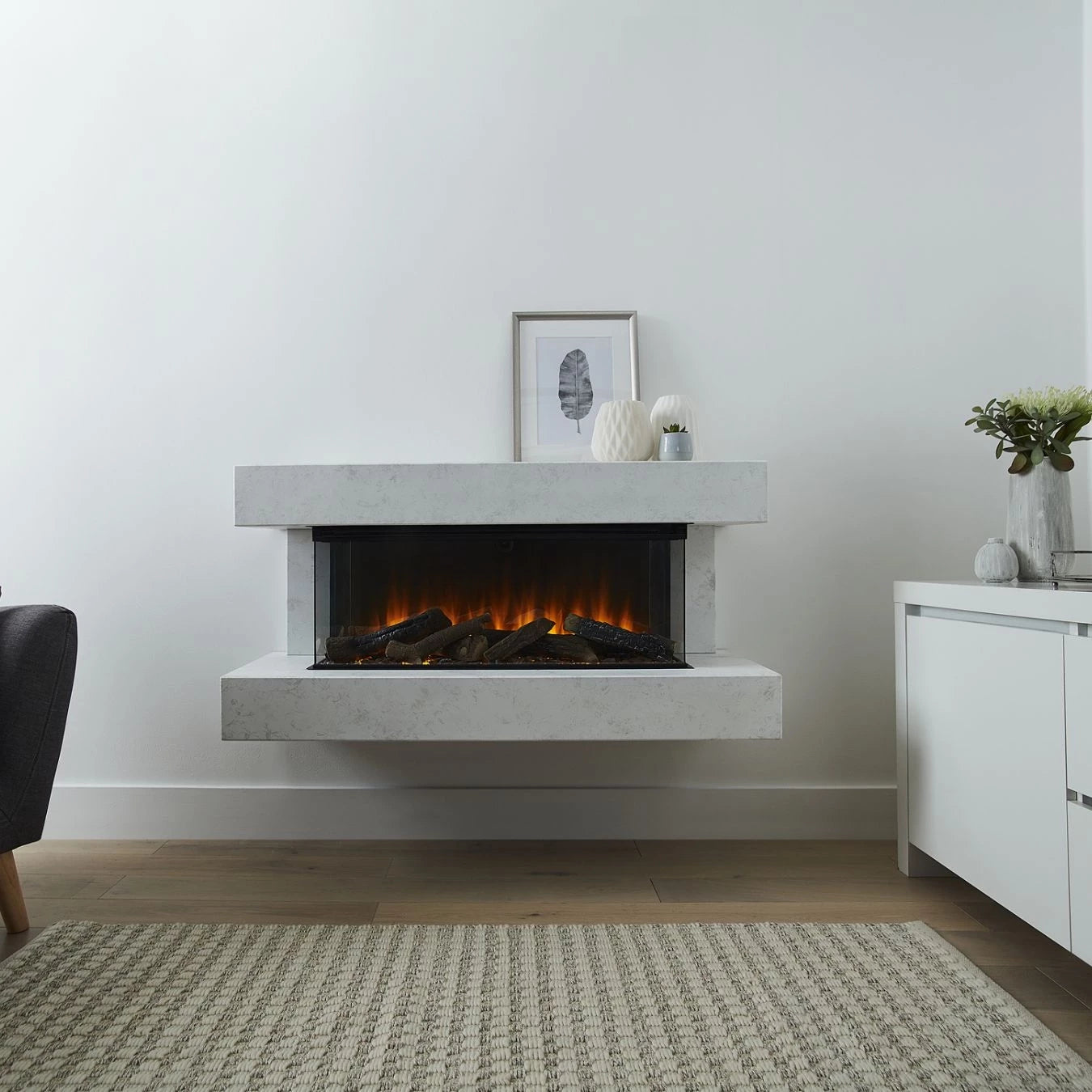 Winchester 1600 White Marble wall-mounted electric fireplace suite with mantel and panoramic flame view